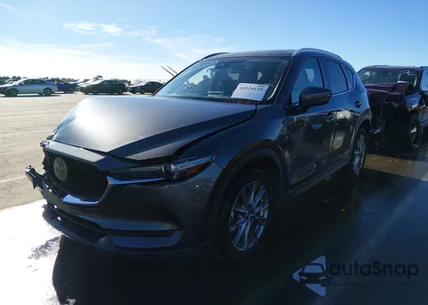 2019 Mazda Cx-5 Grand Touring z USA, uszkodzony, nr VIN JM3KFADM3K1602163